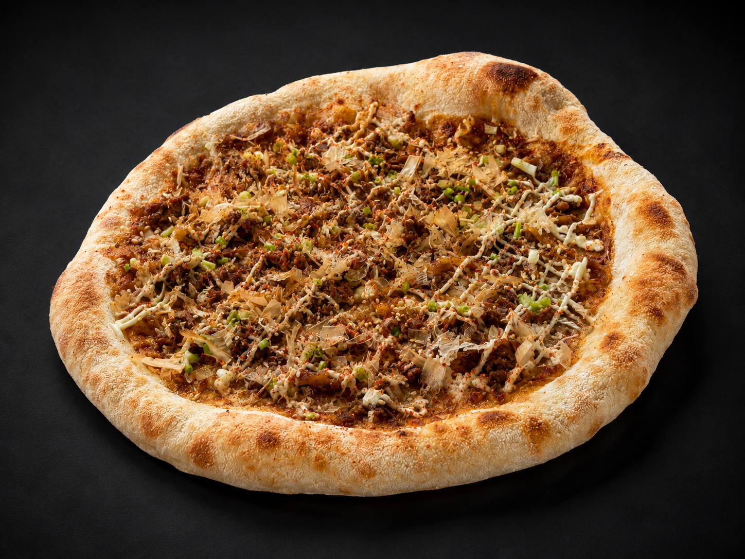Izakaya Deal pizza with teriyaki beef, Kewpie and katsuobushi